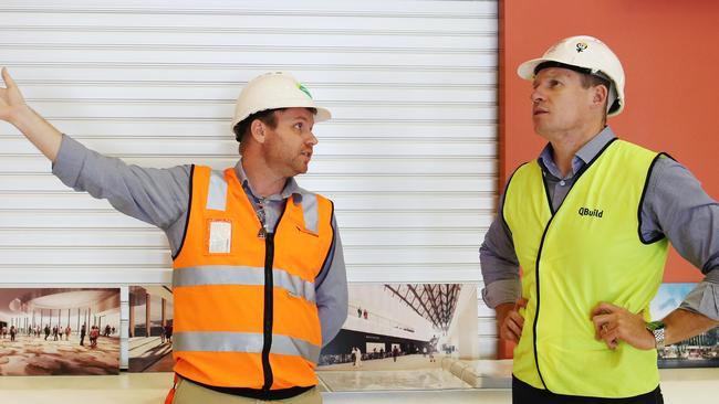 The Cairns Conventions Centre is currently undergoing a $176 million redevelopment by the Queensland Government, which will see critical facilities replaced and refurbished and the floor space expanded. Construction Manager for Land Lease Jason Mulcahy and Queensland Minister Housing and Public Works Mick de Brenni look out over the new reception area. PICTURE: BRENDAN RADKE.