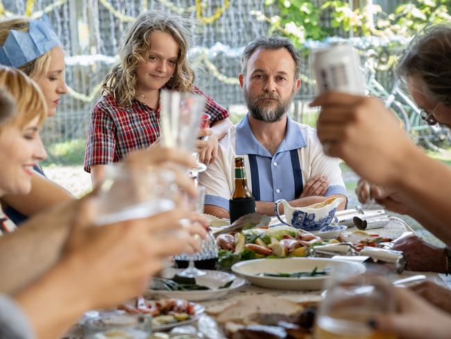 Supplied exclusive first look at BINGE film, How To Make Gravy, based on the Paul Kelly song.. At the end of the table is Angus played by Jonah Wren Phillips and Joe played by Daniel Henshall. Picture: BINGE / Jasin Boland