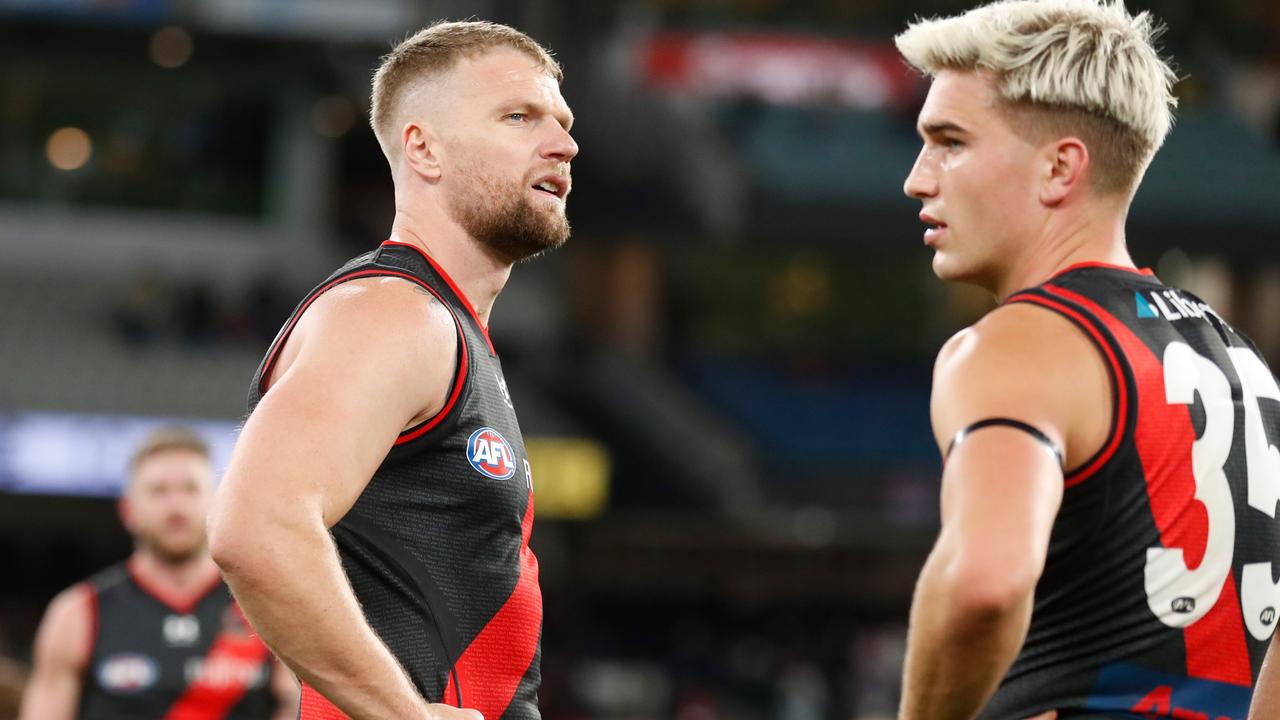 A dejected Jake Stringer (left) after the Bombers’ loss to Carlton. Picture: Michael Willson/AFL Photos via Getty Images