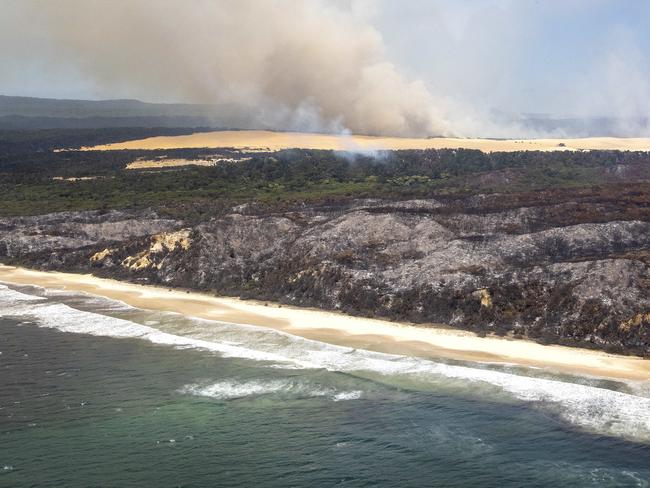 Over 50 percent of Fraser Island has been scorched as a massive bush fires continue to consume the island. Pic: Sarah Marshall