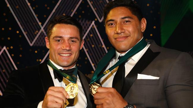 Cooper Cronk and Jason Taumalolo with their Dally M Medals.