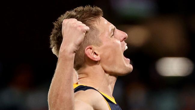 ADELAIDE, AUSTRALIA - AUGUST 22: David Mackay of the Crows celebrates a goal during the 2021 AFL Round 23 match between the Adelaide Crows and the North Melbourne Kangaroos at Adelaide Oval on August 22, 2021 in Adelaide, Australia. (Photo by James Elsby/AFL Photos via Getty Images)