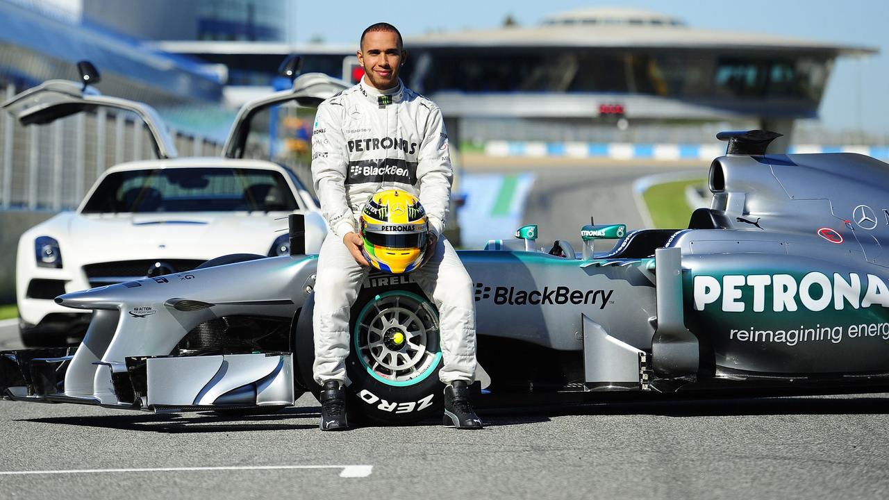 After four straight years without a world title, Hamilton made the big decision to switch to Mercedes in 2013. Photo: AFP PHOTO/ CRISTINA QUICLER