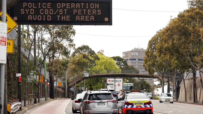 Glebe motorists warned about the mass rally being planned and the police operation in place. Picture: Tim Hunter.