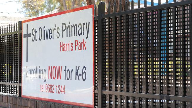 A new mesh security fence surrounds St Oliver’s Catholic School in Harris Park. The fencing is designed to keep strangers from interacting with the school students. Picture: David Swift