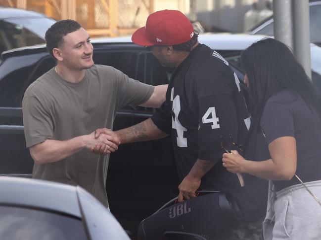 The rapper greeted some fans before boarding. Picture: MEDIA-MODE.COM