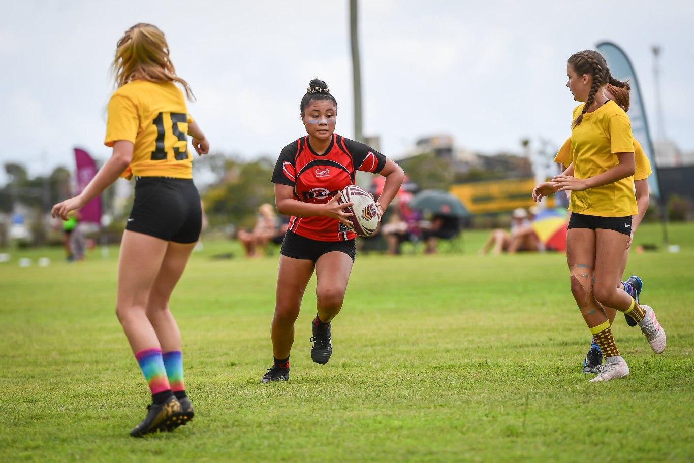 Aces Lanaae Walker attempts to go through the centre of Bundabergs defences.