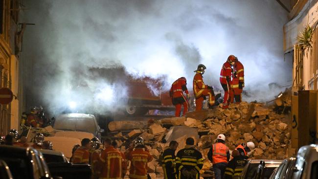 Dust rises from the scene of a building collapse in Marseilles. Picture: Nicolas Tucat/AFP