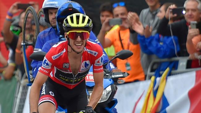 Mitchelton-Scott's British cyclist Simon Philip Yates races to cross the finish line of the 20th stage of the 73rd edition of "La Vuelta" Tour of Spain cycling race, a 97,3 km hilly route from Les Escaldes to Collada de la Gallina in Andorra, on September 15, 2018. (Photo by ANDER GILLENEA / AFP)