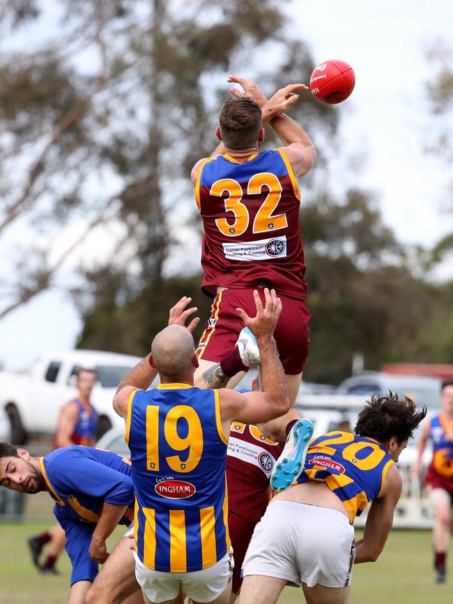 Travis Cloke flies for a mark.