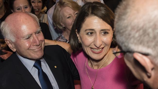 Gladys Berejiklian is congratulated by former prime minister John Howard (left) and current PM Scott Morrison. Picture: Brook Mitchell/Getty Images