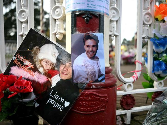 Flowers and pictures to Payne are displayed on a bandstand following the singer's death, in Wolverhampton, central England, where his funeral is set to take place. Picture: Paul ELLIS/AFP