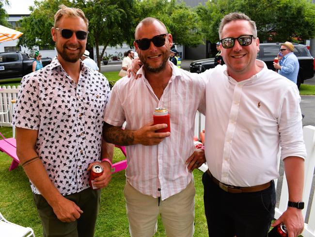 James Knight, Cam Hicks and Grant Guemther enjoying all the action at the Ladbrokes Cranbourne Cup on Saturday, November 23, 2024. Picture: Jack Colantuono