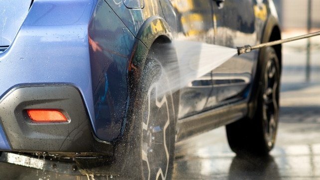 The operator of a service station in Springvale will go to trial over the death of an elderly man inside an automatic car wash.