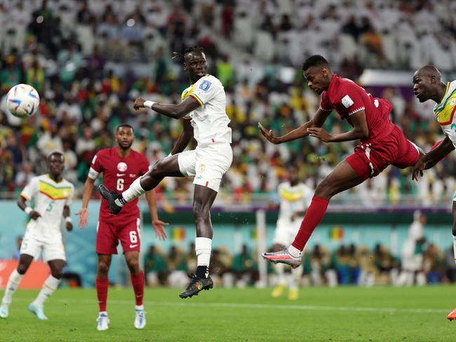 Mohammed Muntari of Qatar scores at last year’s World Cup. Picture: Dean Mouhtaropoulos/Getty Images