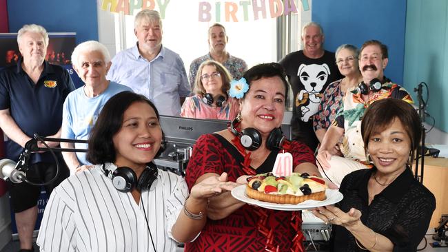 Cairns FM 89.1 community radio station will celebrate 40 years of broadcasting this Saturday The station is on air 24 hours a day thanks to more than 100 volunteers from many different nationalities and ethnic groups. (Front row) Nita Simatupang, Perise Foai Hunt and vice president Prapasiri Techo are joined in celebration by their colleagues Peter Ricketts, Mike Friganiotis, president Brian Stevenson, Itin Hadijah, Glenn Best, Dave Chambers, Anna Chito and Alan Searle at the radio station's studios at Cairns Tafe, Manunda. Picture: Brendan Radke