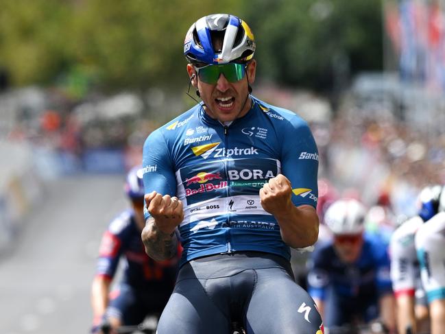 ADELAIDE, AUSTRALIA - JANUARY 26: Sam Welsford of Australia and Team Red Bull - BORA - hansgrohe - Blue Sprint Jersey celebrates at finish line as stage winner during the 25th Santos Tour Down Under 2025, Stage 6 a 90km stage from Adelaide to Adelaide / #UCIWT / on January 26, 2025 in Adelaide, Australia. (Photo by Dario Belingheri/Getty Images)