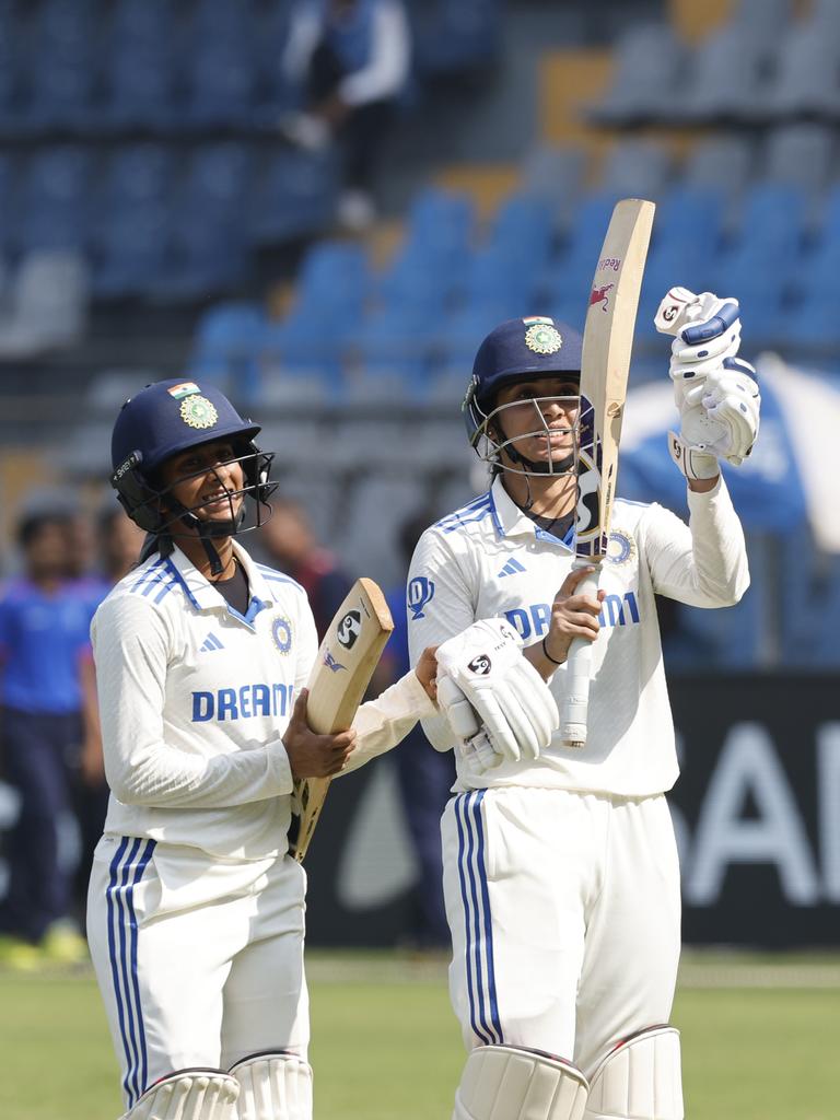 Jemimah Rodrigues and Smriti Mandhana celebrate their run chase over Australia in Mumbai. Picture: Pankaj Nangia/Getty Images