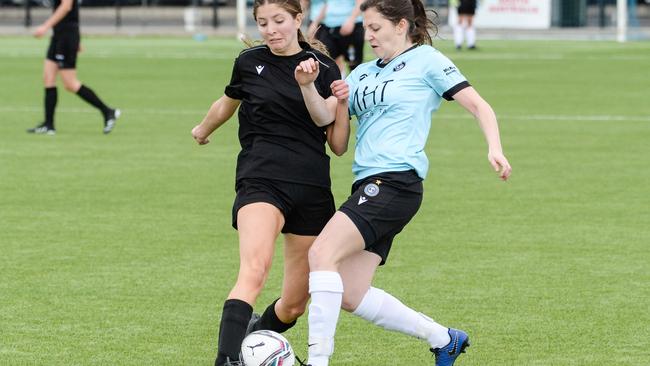 Salisbury Inter Division 1/2/3 player Cassie-Rae Sutcliffe battles for possession against Adelaide Uni. Picture: Brenton Edwards