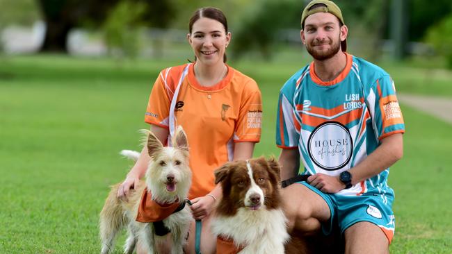 Jennifer Board's sister Siana and Luke Southgate with Jennifer's dogs Simba and Kovu, at Victoria Park in South Townsville. Picture: Evan Morgan