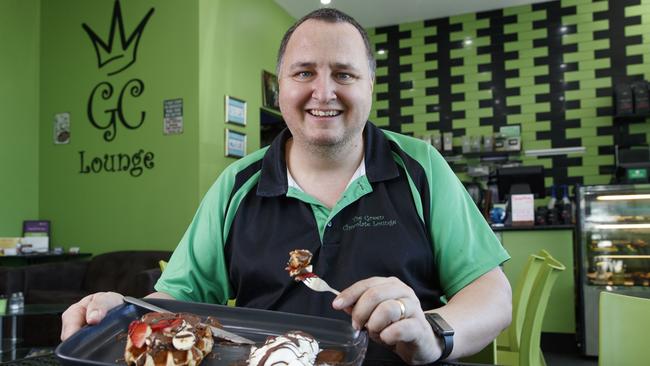 Warren Walker from The Green Chocolate Lounge in Jordan Springs, poses for a photo today, October 19, 2018. Warren hand makes the chocolates in store. (AAP Image/David Swift)