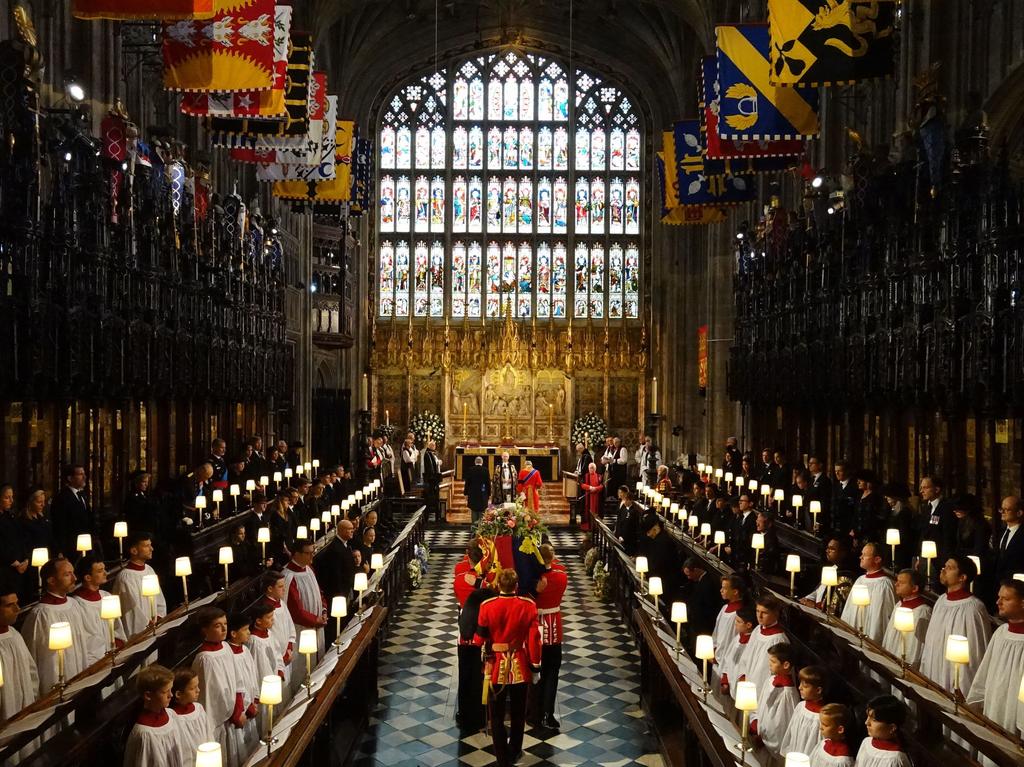 The coffin of Queen Elizabeth II is carried into the Chapel at the Committal Service. Picture: AFP