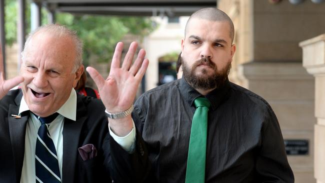 Mitchell Deane Franklin, right, outside the District Court on Tuesday after he was found guilty of dangerous driving and causing the death of great-grandfather Harvie Spencer near Port Pirie in 2013. Picture: Greg Higgs