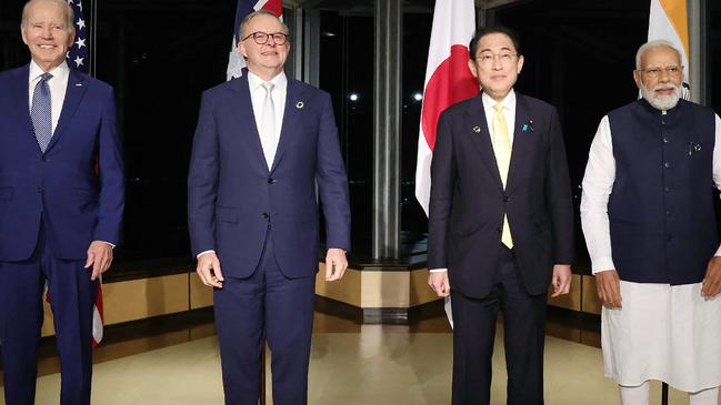 (L to R) US President Joe Biden, Australia's Prime Minister Anthony Albanese, Japan's Prime Minister Fumio Kishida and India's Prime Minister Narendra Modi pose for a photo as they hold a "Quad" meeting on the sidelines of the G7 Summit Leaders' Meeting on May 20, 2023. (Photo by JAPAN POOL / JIJI PRESS / AFP) / Japan OUT