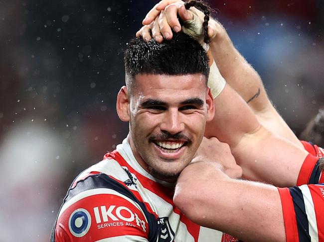 SYDNEY, AUSTRALIA - JUNE 30: Terrell May of the Roosters celebrates with team mates after scoring a try during the round 17 NRL match between Sydney Roosters and Wests Tigers at Allianz Stadium, on June 30, 2024, in Sydney, Australia. (Photo by Brendon Thorne/Getty Images)