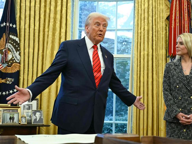 (FILES) US President Donald Trump speaks after Pam Bondi (R) was sworn in as US Attorney General in the Oval Office of the White House in Washington, DC, on February 5, 2025. President Donald Trump wants to abolish birthright citizenship and ship violent criminals -- if he can, even US citizens -- to a notorious Salvadoran prison. He has mocked, insulted and belittled federal judges. And he has forced some of the country's most prestigious law firms into painful submission. In short, Trump has tested the rule of law -- a vital and fundamental pillar of American democracy -- as perhaps never before. When Trump welcomed Salvadoran President Nayib Bukele to the White House, he said he was entertaining the possibility of shipping American citizens who have committed violent acts to be jailed in El Salvador. Trump said he had asked Attorney General Pam Bondi to explore that possibility, though legal experts say it would be clearly unconstitutional. (Photo by ANDREW CABALLERO-REYNOLDS / AFP)