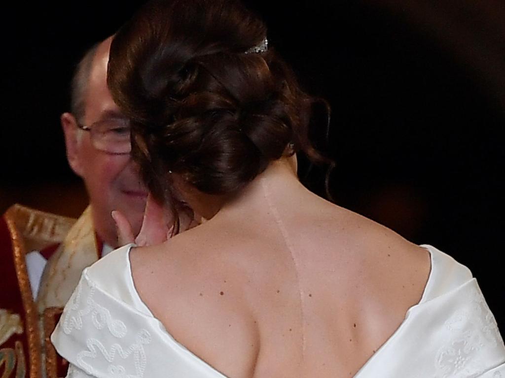 Eugenie said in an earlier interview that she wanted her wedding dress to show her scar  Picture:  TOBY MELVILLE / POOL / AFP