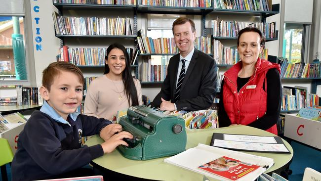 Jacob with his teacher Adrinee Vartanian, principal Brian Story and braille teacher Catherine Davies. Picture: Troy Snook