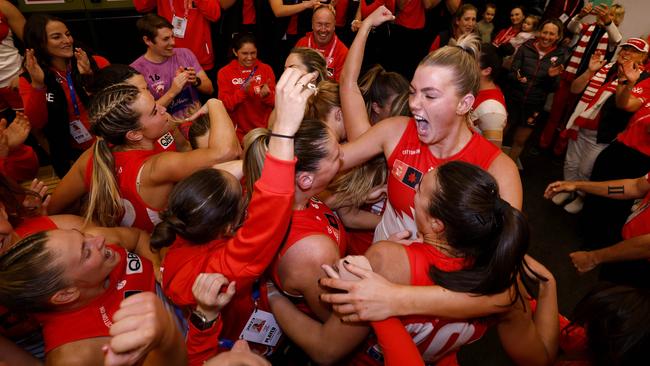 Morphett celebrates with her teammates after the Swans’ win. Picture: Phil Hillyard