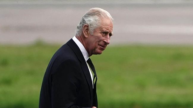 Britain's King Charles III walks to his plane at Aberdeen Airport. Picture: Aaron Chown / POOL / AFP)