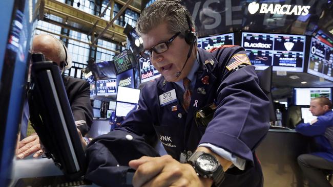 Trader John Panin works on the floor of the New York Stock Exchange, Monday, June 22, 2015. U.S. stocks advanced Monday on hopes of a breakthrough in talks between Greece and its lenders. (AP Photo/Richard Drew)