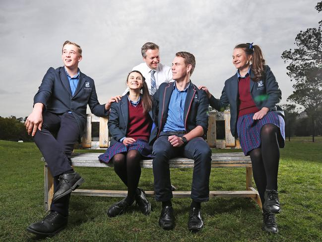 WARNING DO NOT USE BEFORE MONDAY THE 16TH OF SEPTEMBER. Oakwood School head of campus Jesse Wright with students LR Ralph McKechnie, 16, Beatrix Cruickshank, 15, Curtis Simpson, 18 and Maggie Chugg, 16 as the school has the lowest student-teacher ratio.  Picture: Zak Simmonds