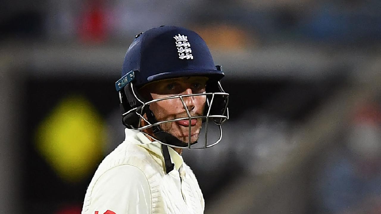 England batsman Joe Root reacts after being bowled by Australia's Scott Boland on the third day of the fifth Ashes cricket Test match between Australia and England in Hobart on January 16, 2022. (Photo by William WEST / AFP) / -- IMAGE RESTRICTED TO EDITORIAL USE - STRICTLY NO COMMERCIAL USE --