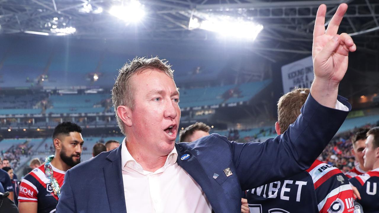 Roosters coach Trent Robinson celebrates victory with fans