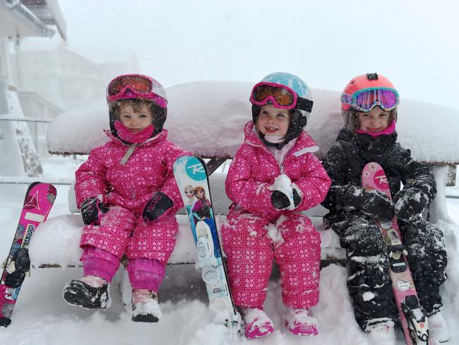 Evi 2, Savanna 4 &amp; Madi 4 are loving the snow dump at Hotham. Picture: Chris Hocking