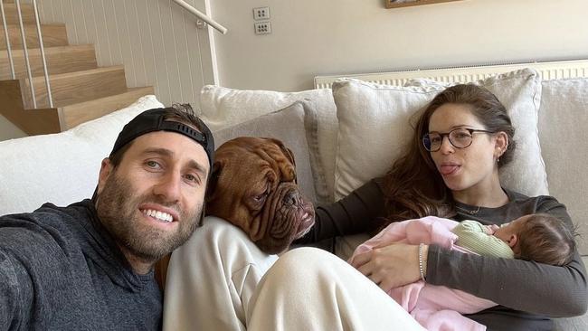 Georgia and Matthew Danos with their dog and baby girl Charlotte. Picture: Instagram