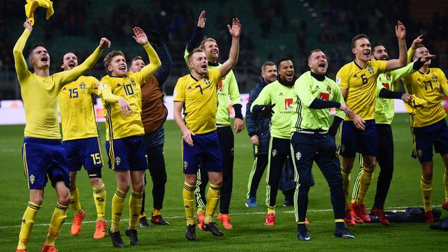 Sweden's players celebrate reaching the World Cup.