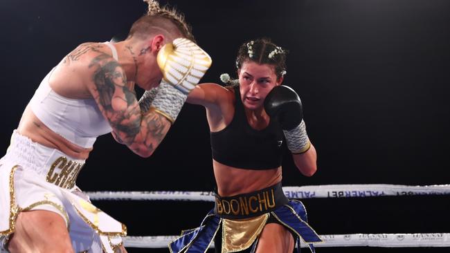 GOLD COAST, AUSTRALIA - DECEMBER 03:  Jasmine Parr punches Nicila Costello during their WIBA Flyweight World Title fight at The Star Gold Coast on December 03, 2022 in Gold Coast, Australia. (Photo by Chris Hyde/Getty Images)