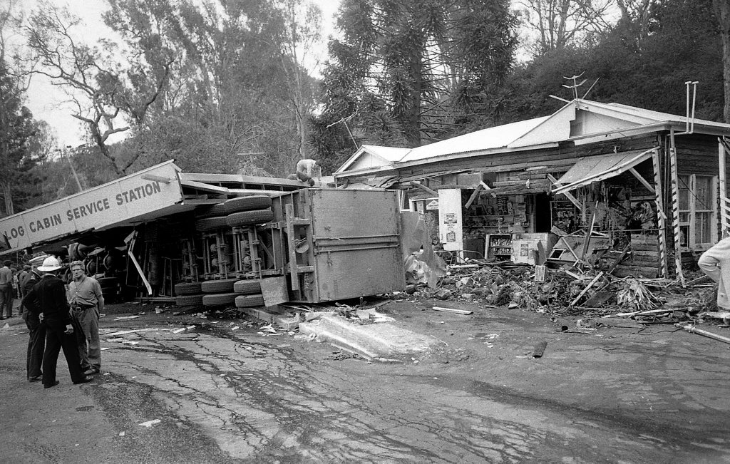 Historic: Toowooba: Accidents Semi-trailer crash at the Log Cabin Service Station on the Toowoomba Range in on 6th September,1978. Three men suffered minor injuries during the crash when the semi-trailer rolled taking out petrol bowsers. A car parked at the service station was also damaged. Photo: Bruce Mackenzie / The Chronicle Neg U869. Picture: Bruce Mackenzie