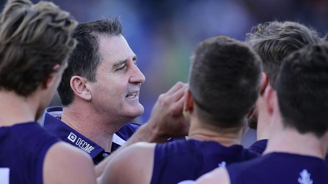 Dockers coach Ross Lyon addresses the players at the three quarter time break during the round 20 AFL match between the Fremantle Dockers and the West Coast Eagles.