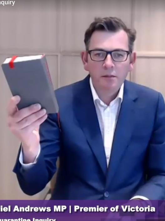 Daniel Andrews holds the bible pledging to tell the inquiry the truth. Picture: Supplied