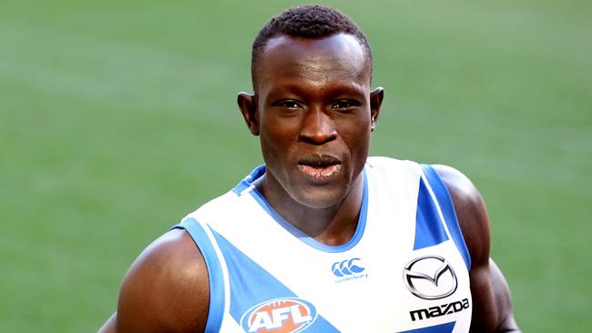 MELBOURNE, AUSTRALIA - JUNE 19:  Majak Daw of the Kangaros looks on during an AFL press conference at Etihad Stadium on June 19, 2018 in Melbourne, Australia.  (Photo by Kelly Defina/Getty Images)