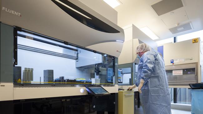 AFP experts working at the Forensic Facility in Canberra. Picture: NCA NewsWire / Martin Ollman