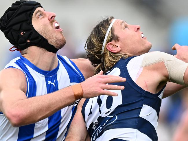 HOBART, AUSTRALIA - JULY 27: Tristan Xerri of the Kangaroos and Mark Blicavs of the Cats compete in a ruck contest during the round 20 AFL match between North Melbourne Kangaroos and Geelong Cats at Blundstone Arena, on July 27, 2024, in Hobart, Australia. (Photo by Steve Bell/Getty Images)