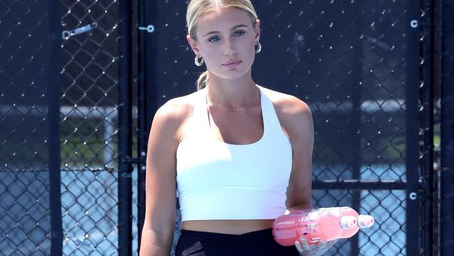 Bernard Tomic's girlfriend Keely Hannah is among a couple of dozen spectators for his second round Challenger tournament match against Jason Kubler. Picture: Steve Pohlner