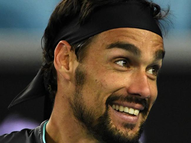 Italy's Fabio Fognini reacts after a point against Australia's Alex De Minaur during their men's singles match on day six of the Australian Open tennis tournament in Melbourne on February 13, 2021. (Photo by Paul CROCK / AFP) / -- IMAGE RESTRICTED TO EDITORIAL USE - STRICTLY NO COMMERCIAL USE --